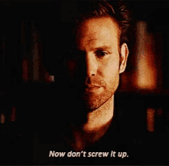 a man says " now don t screw it up " in a dark room