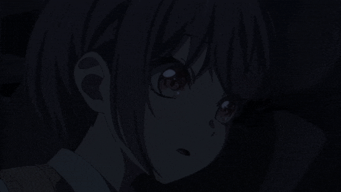 a close up of a girl with purple eyes