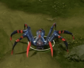 a blue and red spider with red legs is flying in the air