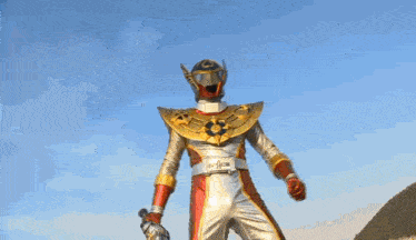 a close up of a superhero 's face with a helmet that has the letter o on it