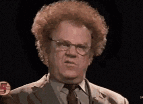 a man with curly hair and glasses is making a funny face .