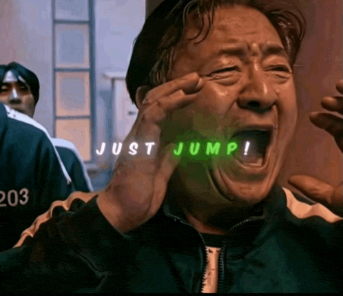 a man is crying with the words just jump written on his face
