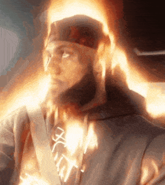 a man with a beard wearing a hoodie that says ' x-men ' on it