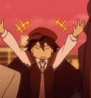 a man in a suit and tie is standing with his arms outstretched and making a funny face .