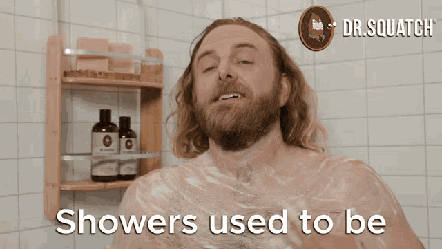 a man in a shower with the words showers used to be