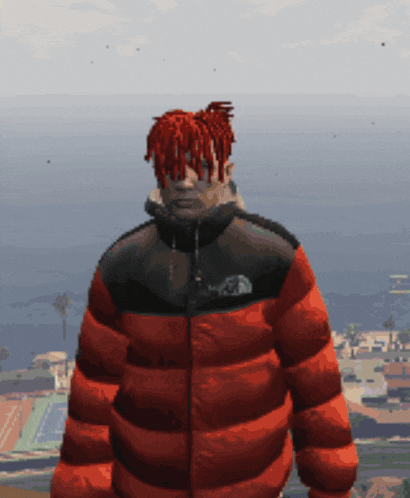 a man with red hair and dreadlocks is wearing a red north face jacket