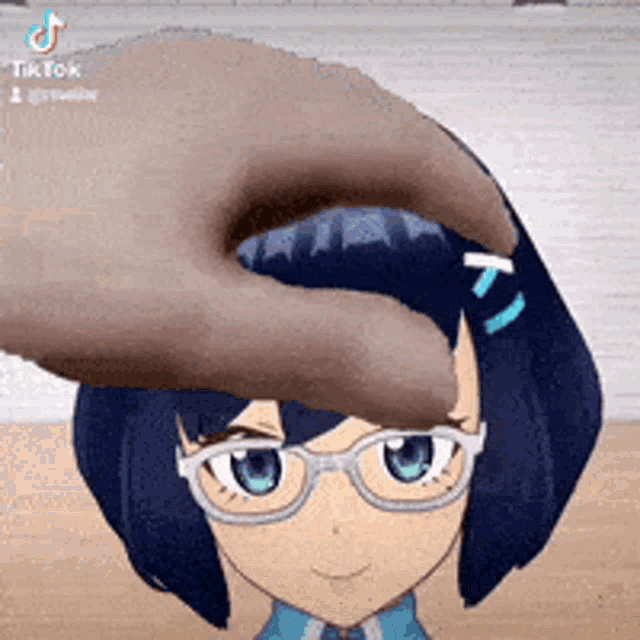 a person is putting a donut in a girl 's hair .