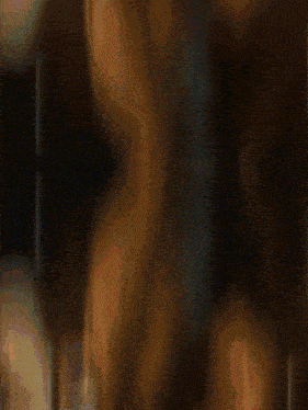 a close up of a person 's face with a blurred background that says ' i love you ' on it