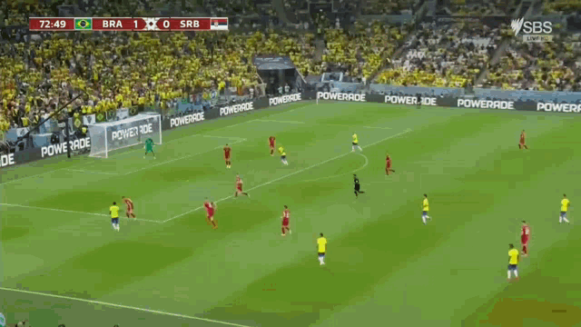 two soccer players are celebrating a goal during a game between brazil and srb