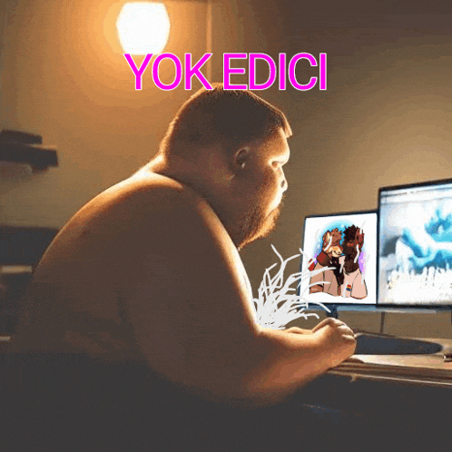 a shirtless man sits in front of a computer with the words yok edici written above him