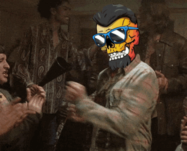 a man wearing a skull mask and sunglasses applauds