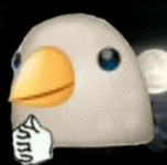 a white bird with a yellow beak and blue eyes is giving a thumbs down .