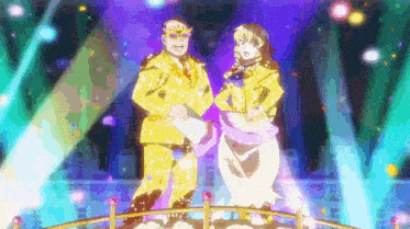 a man and a woman are standing next to each other on a stage .