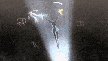 a cheerleader is flying through the air in a dark cave