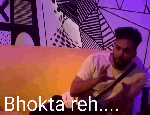 a man sitting on a couch with the words bhoktareh written on the bottom