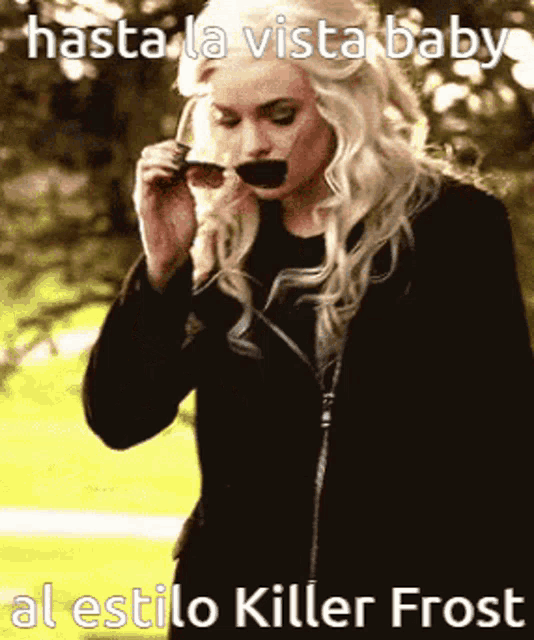 a woman wearing sunglasses with the words hasta la vista baby al estilo killer frost written below her