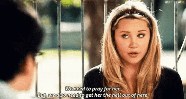 a woman is talking to a man and saying we need to pray for her but we also need to get her the hell out of here