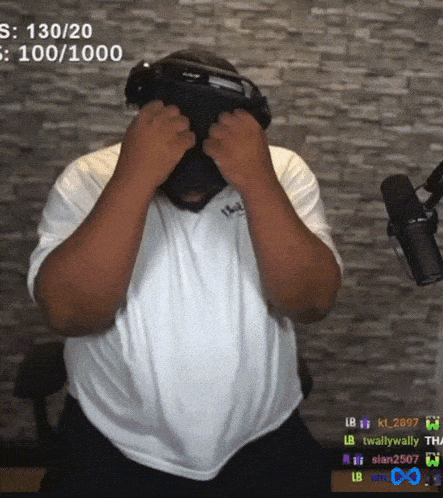 a man wearing a virtual reality headset with the number 130/20 on the bottom right
