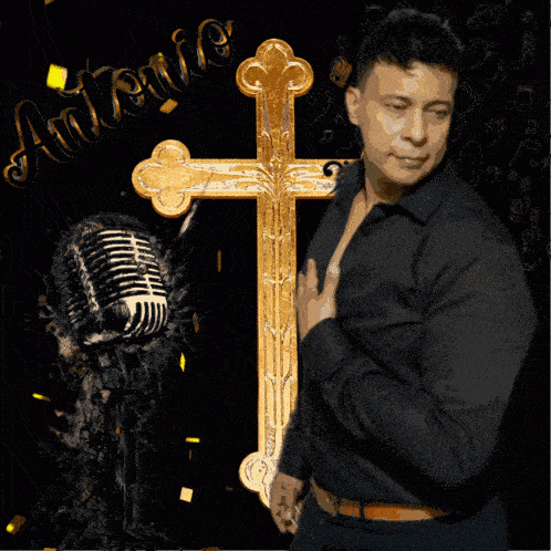 a man in a black shirt is standing in front of a gold cross and a microphone with the name antonie written on the bottom