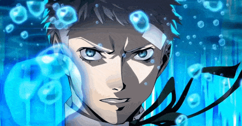 a close up of a man 's face with blue bubbles surrounding him