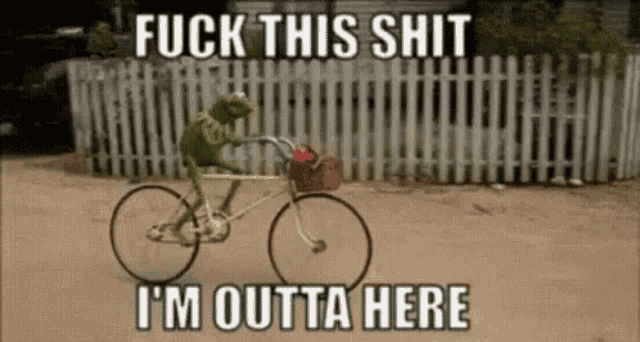 a kermit the frog is riding a bicycle with a basket on the front .