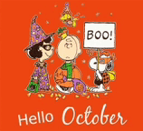 snoopy , charlie brown and a witch are holding a sign that says boo !