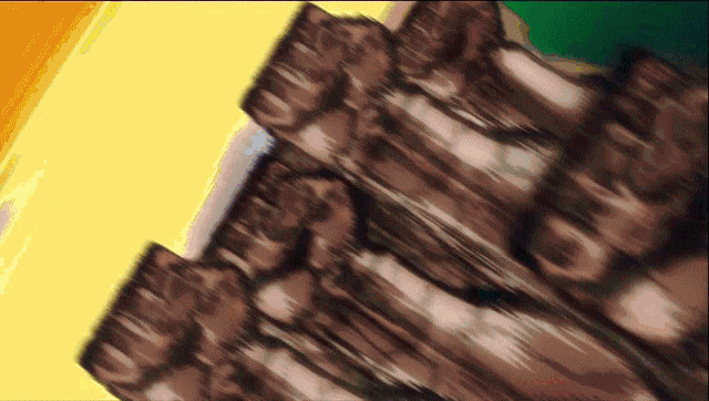 a blurry picture of a bunch of people 's fists against a yellow background