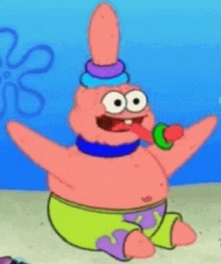 patrick star from spongebob squarepants is wearing a colorful hat and holding a lollipop in his mouth .