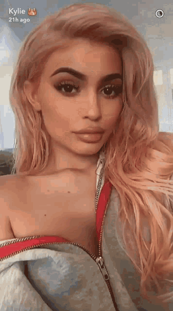 a close up of a woman 's face with the name kylie on the bottom