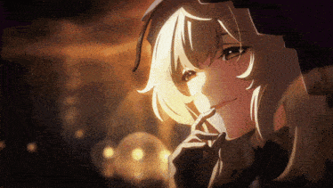a close up of a girl 's face with the sun shining on her face