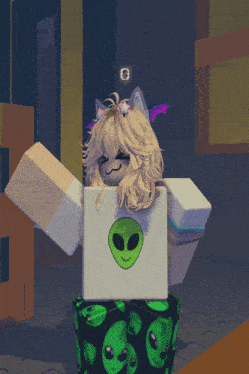 a girl with a cat ear and a green alien on her shirt