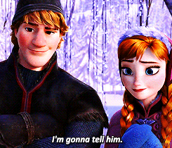 anna and kristoff from frozen are standing next to each other and i 'm gonna tell him