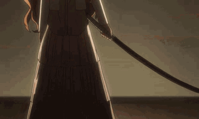 a woman in a white dress is holding a long sword .