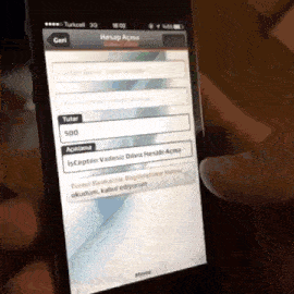 a person is using a phone with turkcell 3g