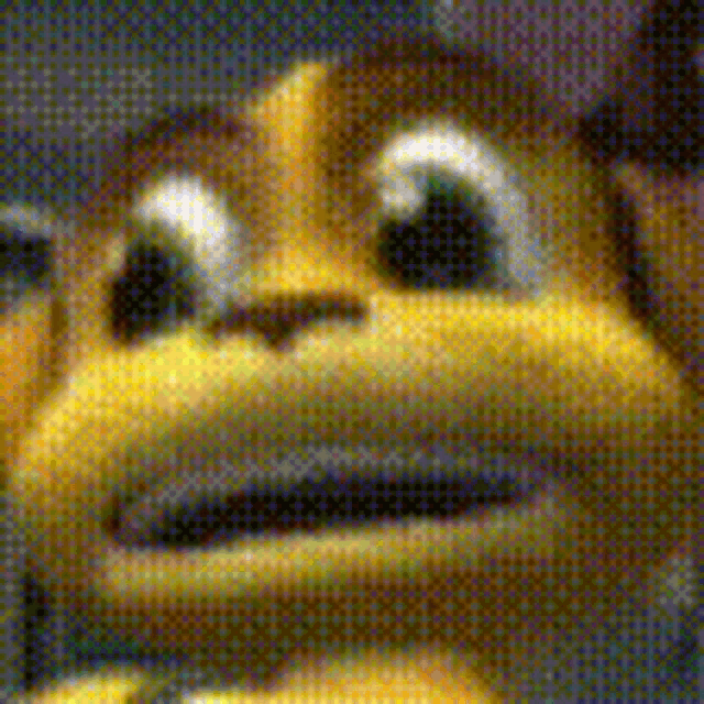 a close up of a yellow cartoon character with a surprised look on his face .