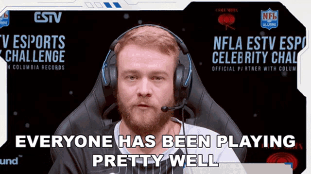 a man wearing headphones with the words everyone has been playing pretty well
