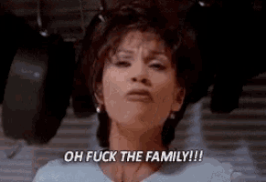a woman is making a funny face and says `` oh fuck the family ! ''