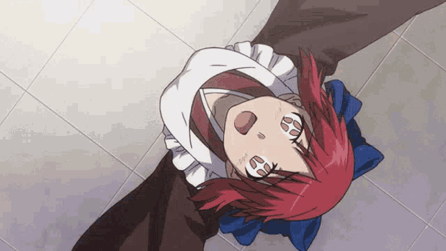 a girl with red hair and a white apron is laying on the floor