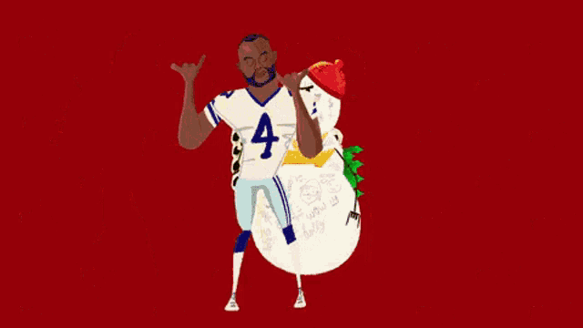 a football player with the number 4 on his jersey stands next to a snowman with a gold chain around his neck