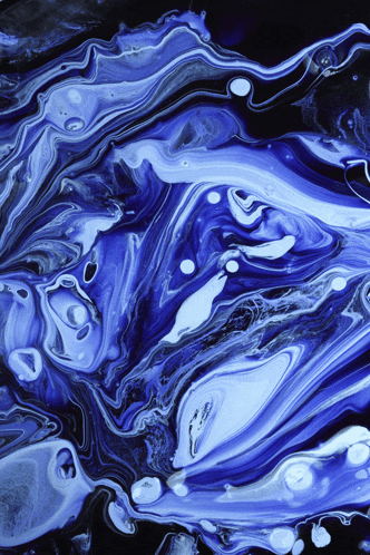 a painting of blue and white swirls on a dark background