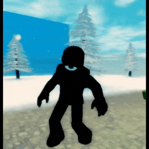 a silhouette of a person standing in the snow