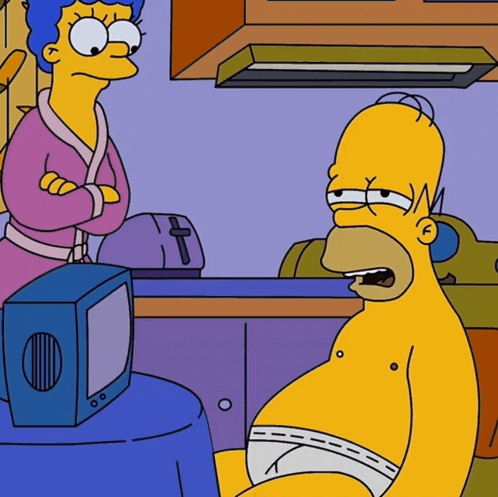 a cartoon of homer simpson sitting in front of a tv