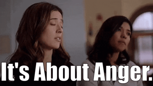 two women are sitting next to each other and the words it 's about anger are above them