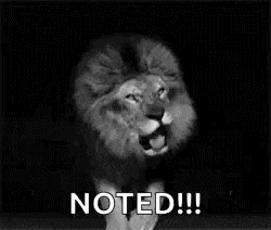 a black and white photo of a lion with the words `` noted ! ''