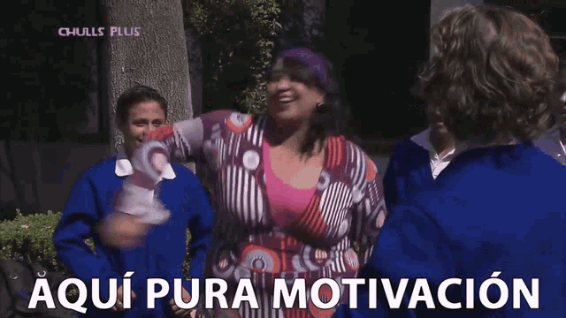 a woman in a colorful shirt is surrounded by children and the words aqui pura motivacion are displayed