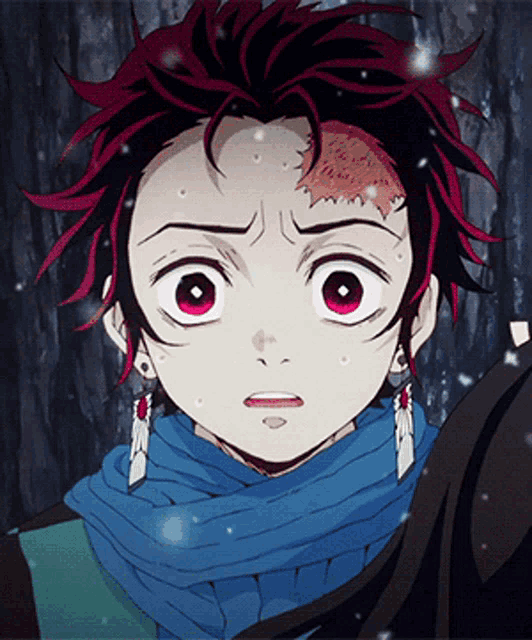 a close up of a person 's face with a scarf around his neck