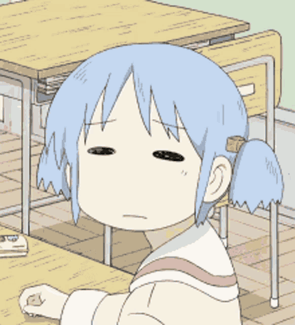 a cartoon girl with blue hair is sitting at a desk with her eyes closed
