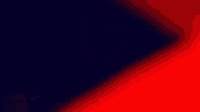 a close up of a red arrow on a black background .