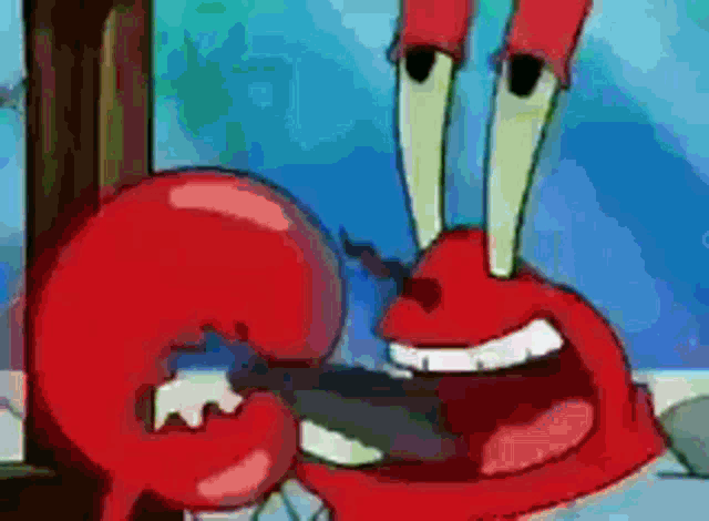 a close up of a crab from spongebob squarepants holding a fish in his mouth .