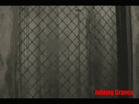 a blurred image of a person with the name johnny graves on the bottom right